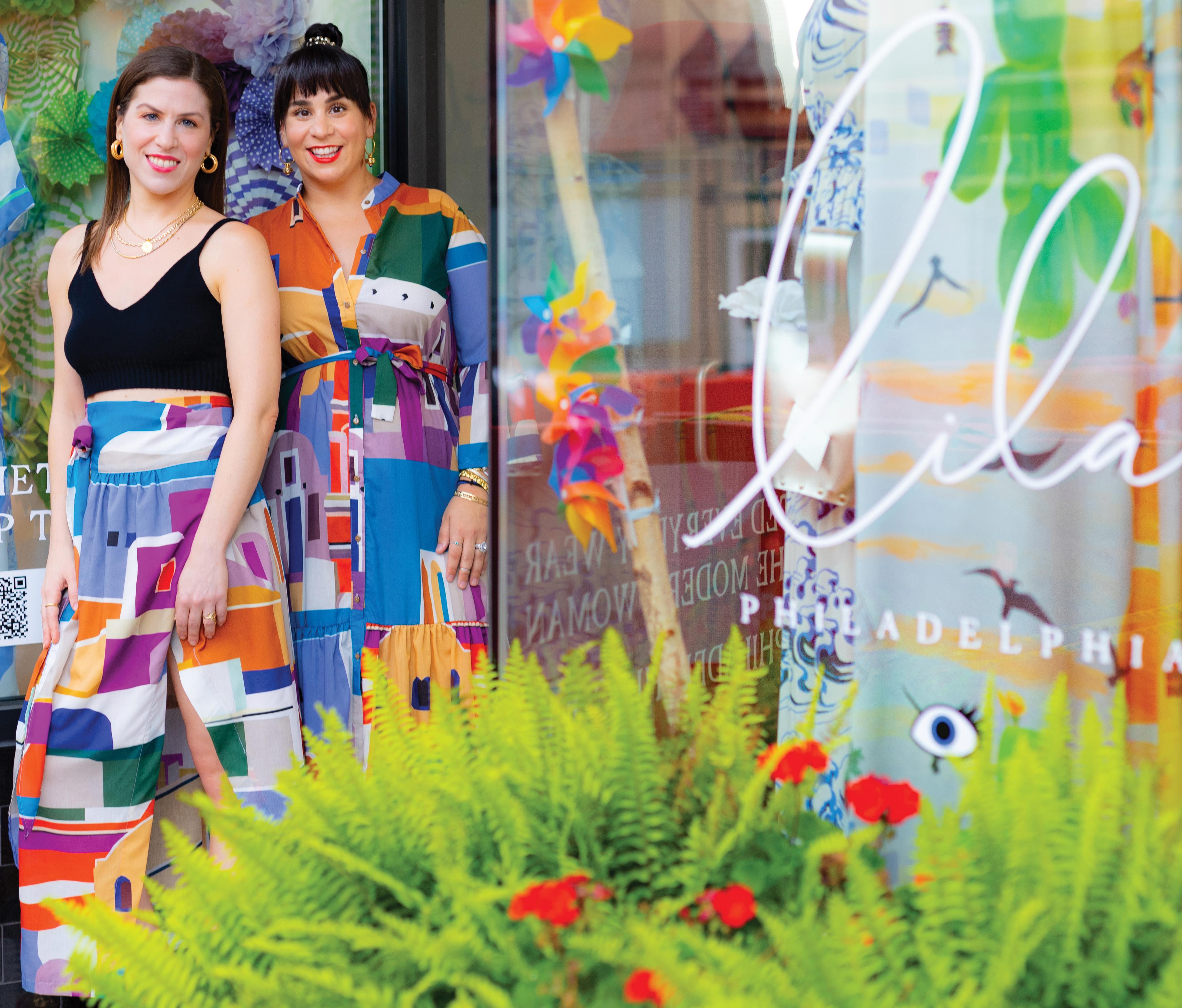 Lisa Lamprou and sister Laura Anne in front of their store