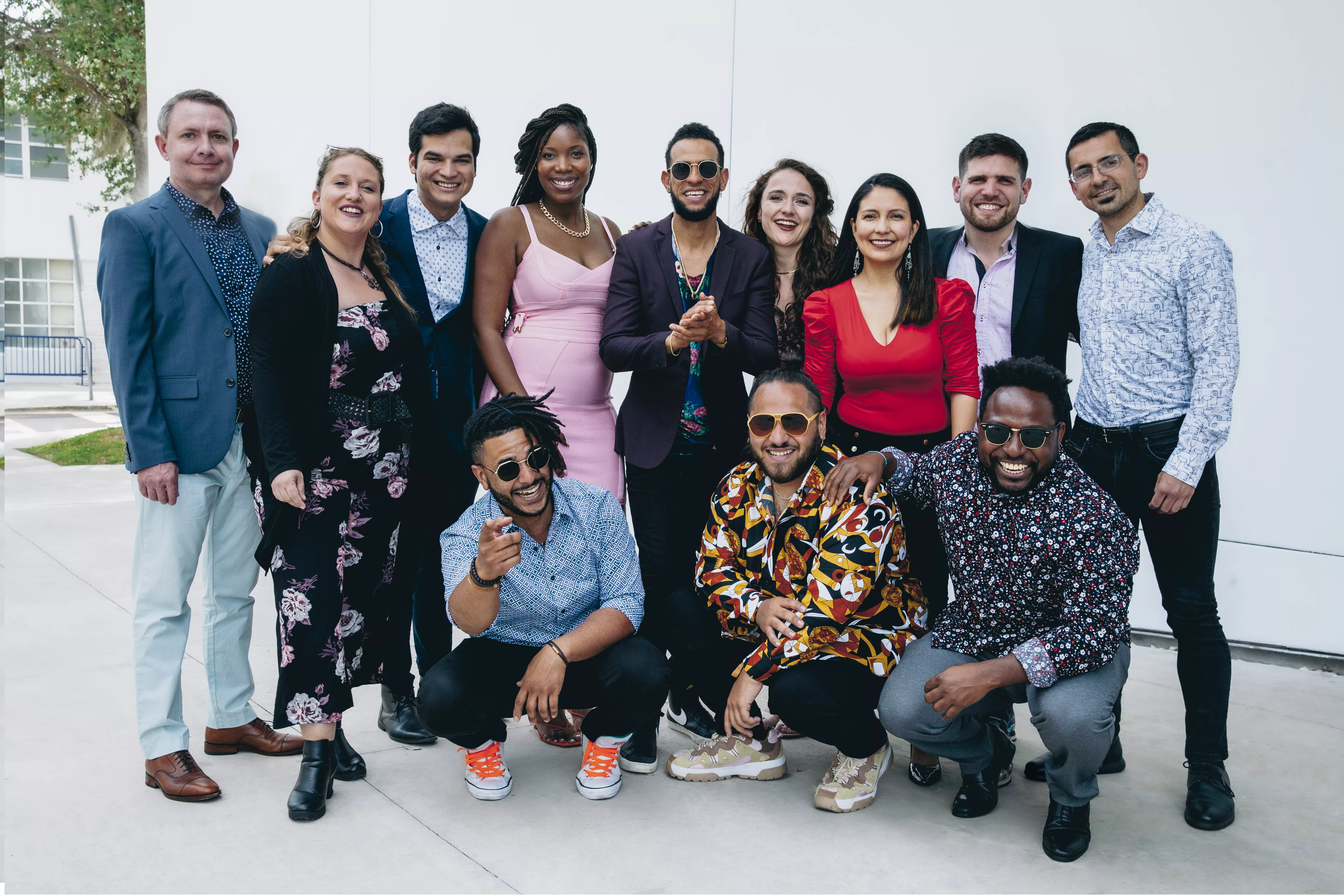 Band of musicians in front of white background